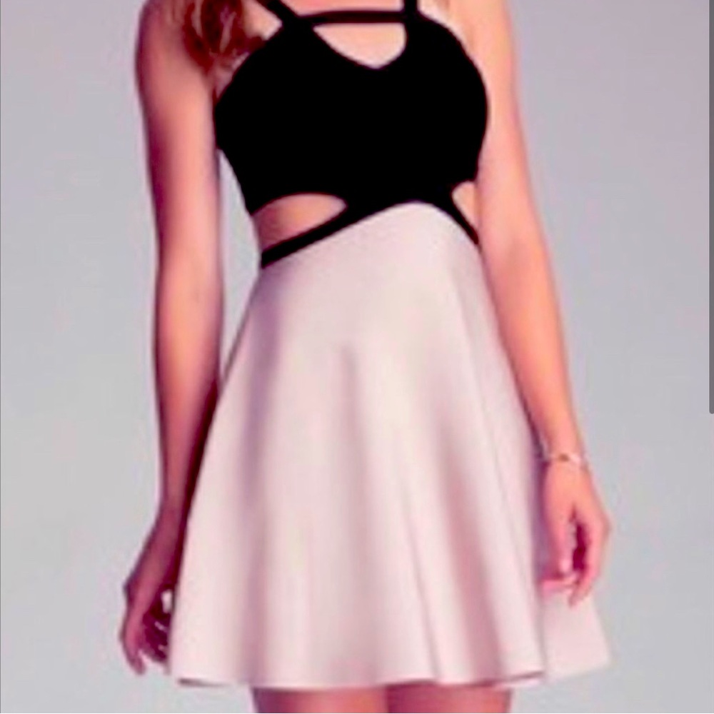 Bebe dress. Heavy bandage like material. Gorgeous and sold out in stores!!